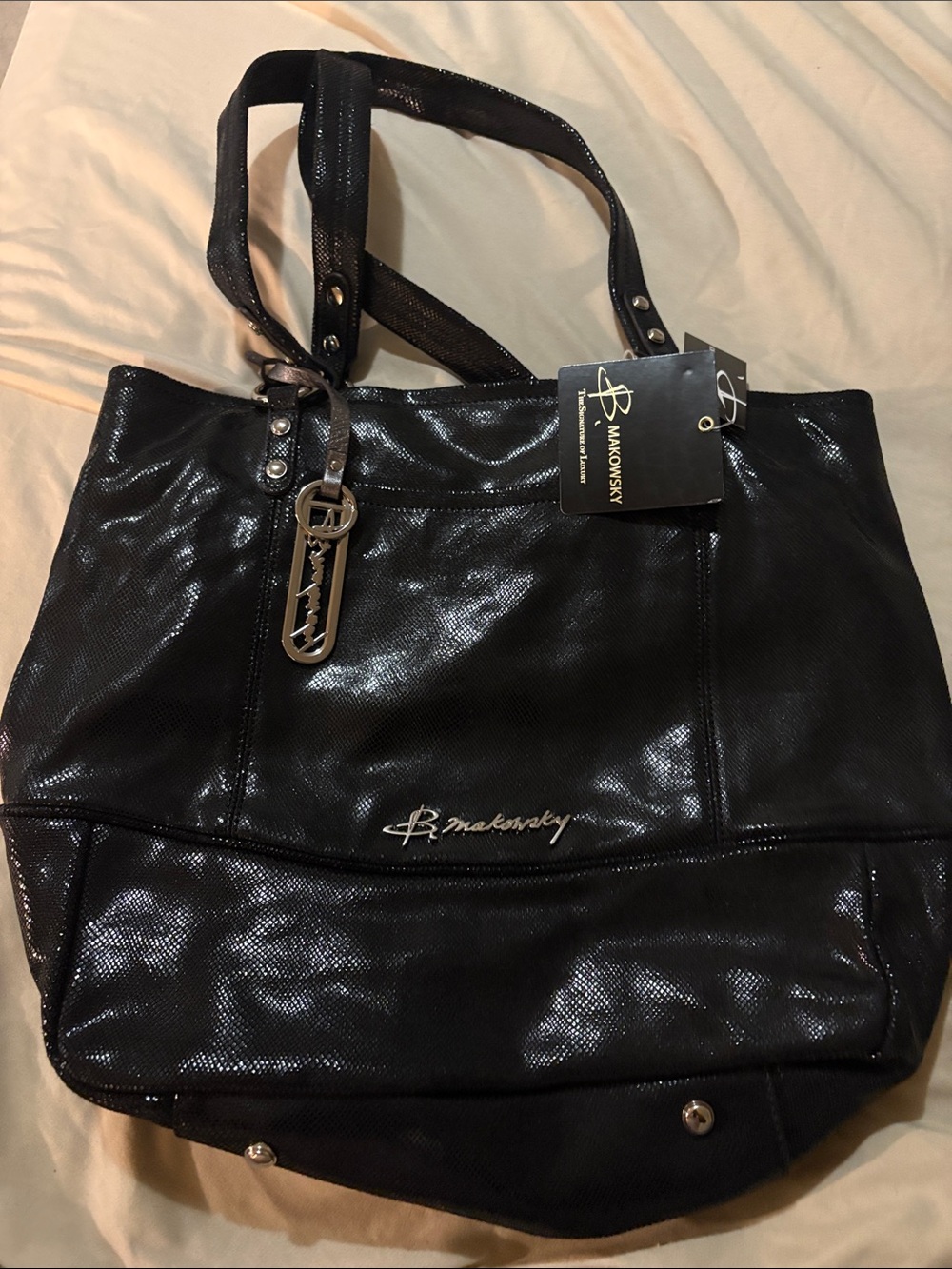 B. Makowski black leather snakeskin